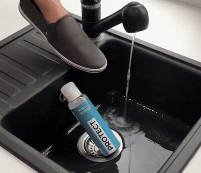 Bottle Of Protect In Sink GIF