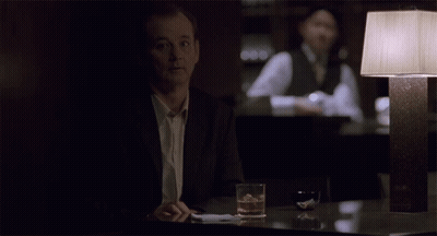 Bottle Of Wine On Pillow GIF