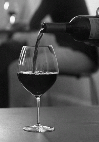 Bottle Of Wine Poured Into Wine Glass GIF