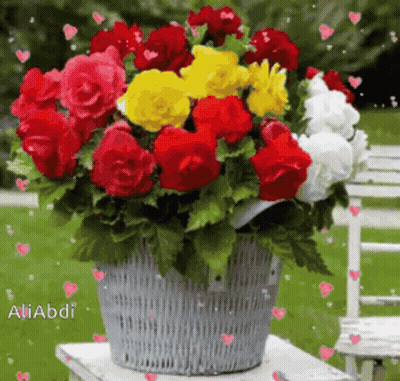 Bouquet Of Colorful Flowers In A Basket GIF