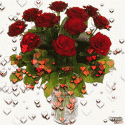 Bouquet Of Red Roses In Clear Vase GIF