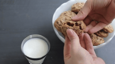 Bowl Of Chocolate Chip Cookies And Glass Of Milk GIF