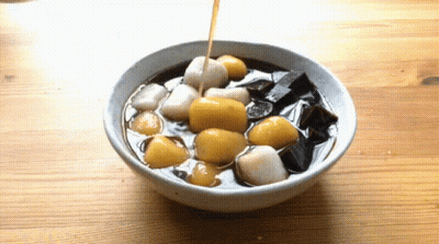 Bowl Of Food Being Poured Into Bowl GIF