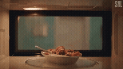 Bowl Of Food In Microwave With SNL Logo GIF
