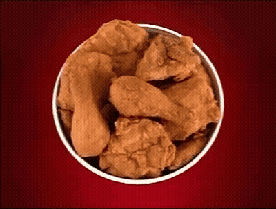 Bowl Of Fried Chicken On Red Surface GIF