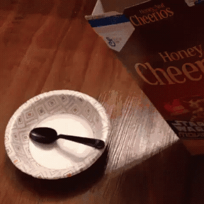 Bowl Of Honey Bunches Of Cheerios Next To Box GIF
