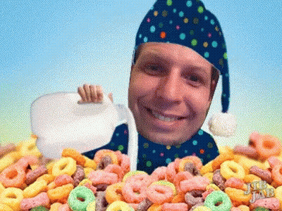 Bowl Of Honeycomb Cereal Next To Box GIF