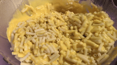 Bowl Of Macaroni And Cheese With Sauce GIF