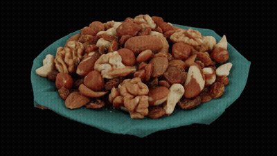 Bowl Of Nuts On Blue Cloth GIF