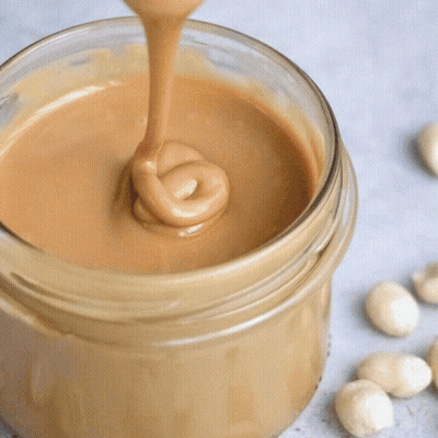 Bowl Of Peanut Butter With Spoon GIF