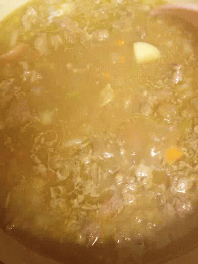 Bowl Of Soup With Meat And Vegetables GIF