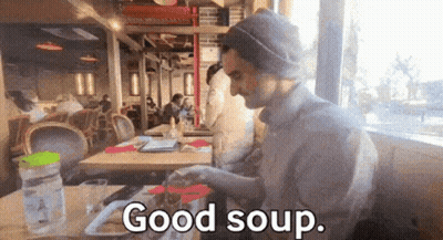 Bowl Of Soup With Noodles And Vegetables GIF