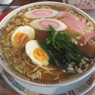 Bowl Of Soup With Noodles Eggs And Spinach With Chinese Characters GIF