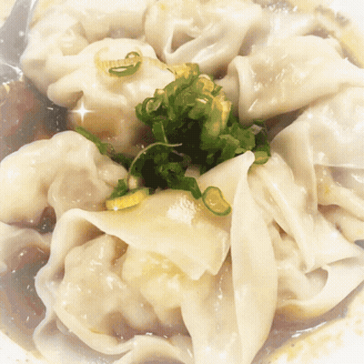 Bowl Of Wonton Soup With Green Onions GIF