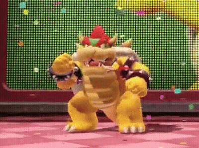 Bowser Is Dancing In Front Of A Screen With Confetti Falling From It . GIF