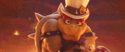 Bowser Is Holding A Mushroom And Wearing A Top Hat . GIF