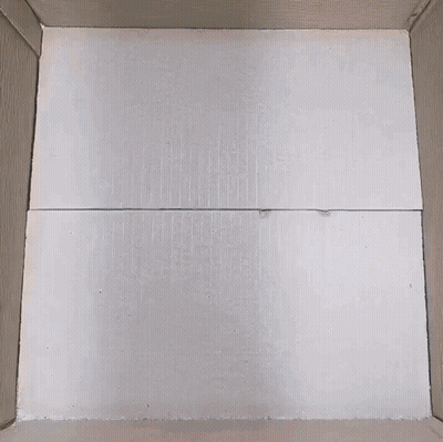 Box Filled With Pink And Blue Styrofoam GIF