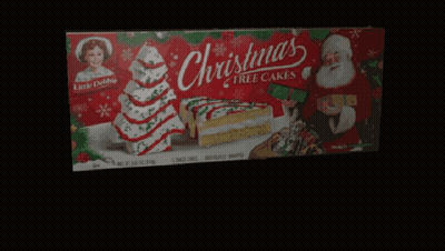 Box Of Christmas Cake With Nutrition Facts GIF
