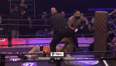 Boxer In Ring With Crowd And Texas Text GIF