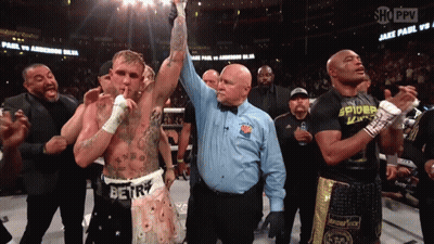 Boxer In Spider Shirt Being Congratulated GIF
