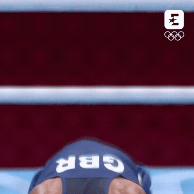 Boxer Wearing Helmet Saying GBR In Boxing Ring GIF