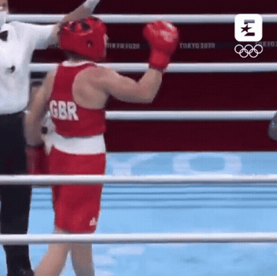 Boxer With GBR On Shirt Throwing Punch GIF