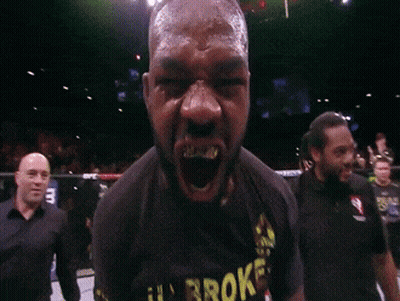 Boxer With Microphone In Ring GIF