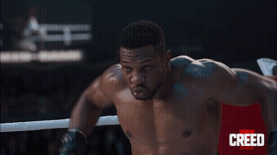 Boxers Fighting In Creed Ring GIF