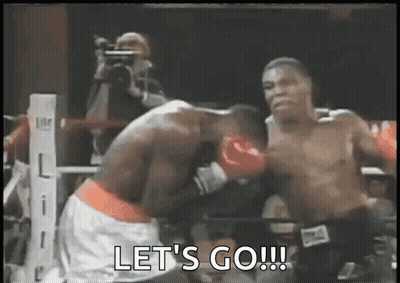 Boxers Fighting In Ring Saying Lets Go GIF