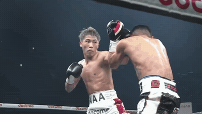 Boxers Fighting In Ring With Docomo GIF