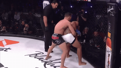 Boxers Fighting In Ring With Jumbo Shorts GIF