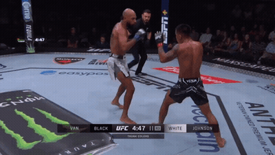 Boxers Fighting In Ring With Monster Energy GIF