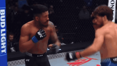Boxers Fighting In Ring With UFC Glove GIF