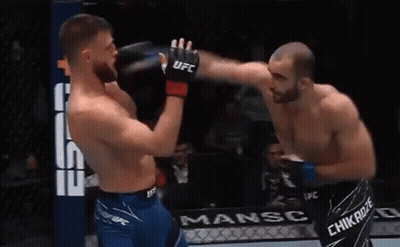 Boxers Fighting In Ring With UFC Gloves GIF