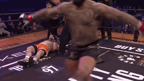 Boxing Match In Ring Saying Buy GIF
