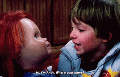 Boy And Doll Saying Hi I'm Andy GIF