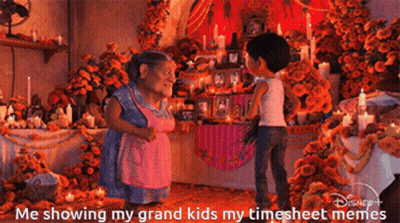 Boy And Elderly Woman Standing In Front Of Flowers GIF
