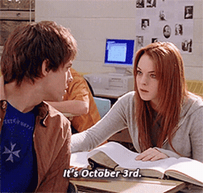Boy And Girl At Desk Girl Says It's October 3Rd GIF
