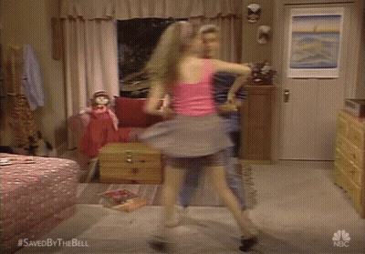 Boy And Girl Dancing In Room With Peace Sign GIF