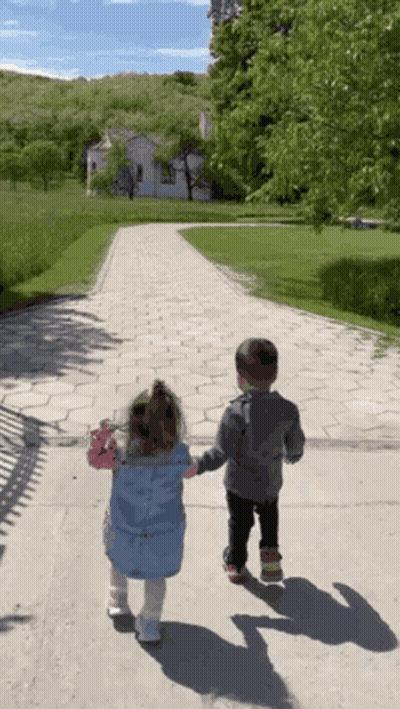 Boy And Girl Holding Hands GIF
