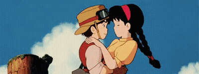 Boy and Girl Hugging and Looking at Each Other