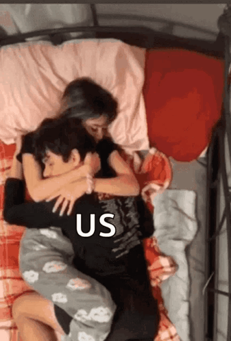 Boy And Girl Hugging On Bed GIF