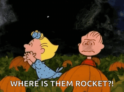 Boy And Girl In Pumpkin Patch Looking At Rocket GIF