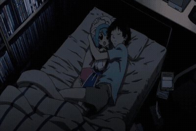 Boy And Girl Laying On Bed With Bookshelf GIF