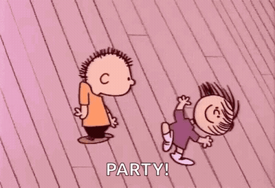 Boy And Girl Laying On Wooden Floor Saying Party GIF