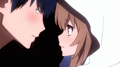 Boy And Girl Looking At Each Other In Dark Room GIF