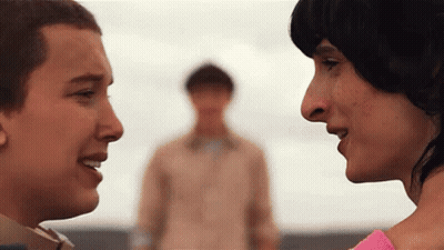 Boy And Girl Looking At Each Other GIF