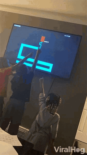 Boy And Girl Playing Video Game GIF
