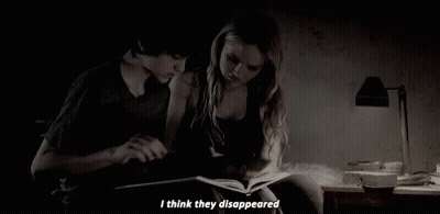 Boy And Girl Reading Book Girl Saying They Disappeared GIF