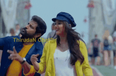Boy And Girl Sitting In Front Of Heart GIF